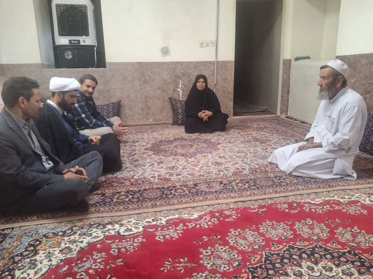 دیدار و تجلیل از خانواده شهید محمد اسلام ریزه‌ای در تایباد